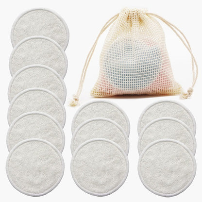 Set of reusable makeup remover pads with a mesh storage bag on a white background